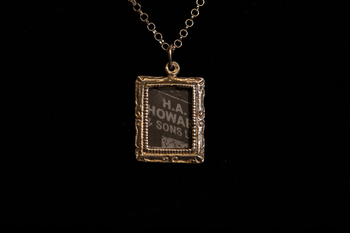 Sterling Silver photo frame necklace containing a picture of Manchester shot on film.