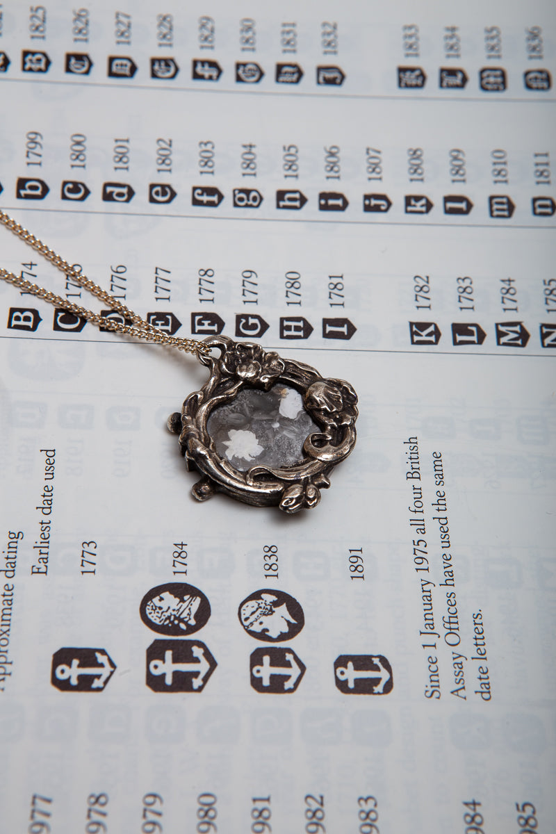 Beautifully detailed photo frame locket style necklace