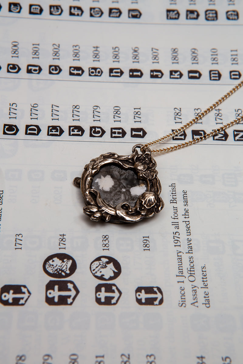 Beautifully detailed photo frame locket style necklace