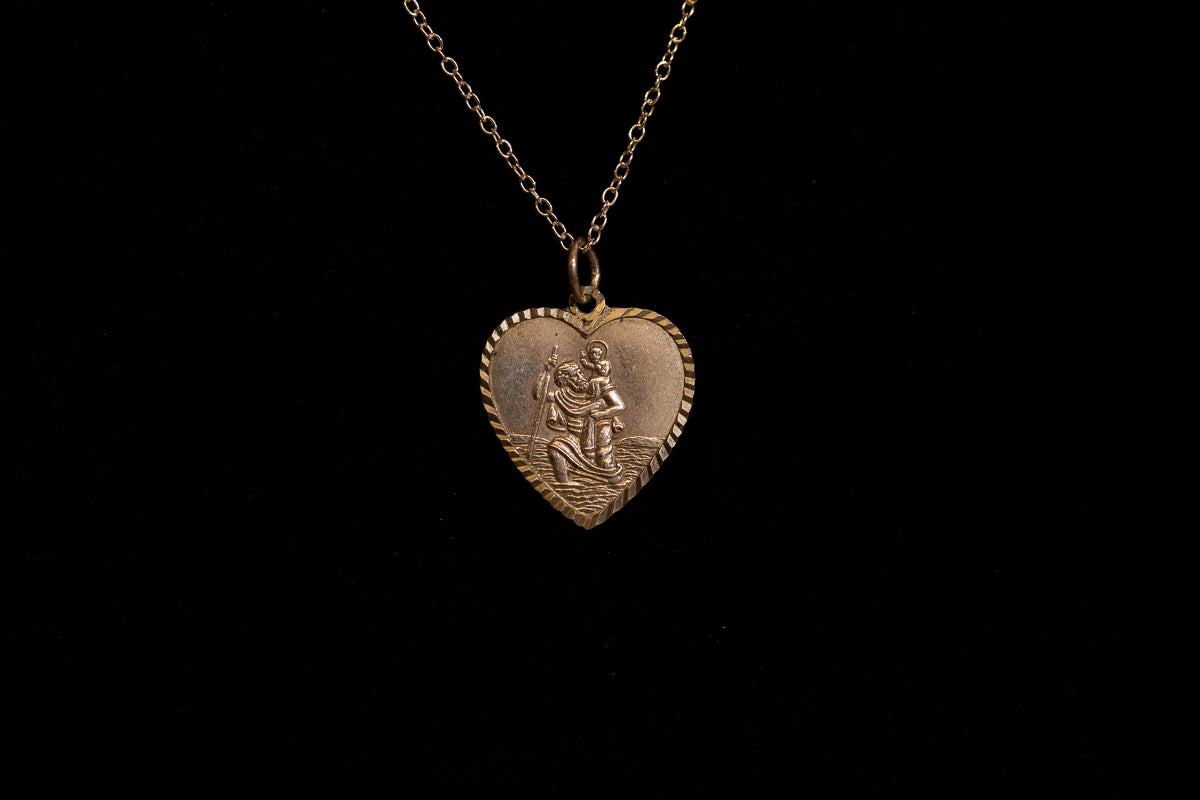 Heart Shaped sterling silver Saint Christopher necklace.