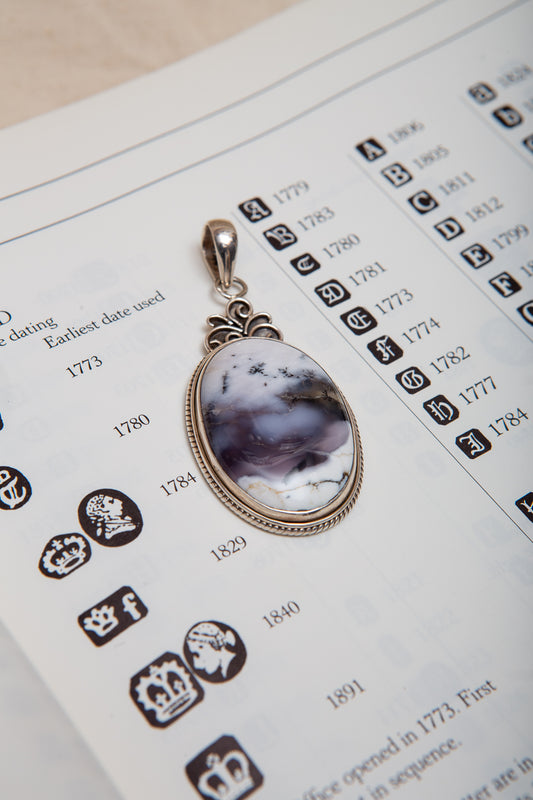 Beautiful Dendritic Opal Pendant with gorgeous inclusions in a sterling silver setting.