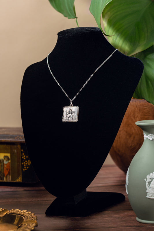 Large square silver pendant depicting Saint Christopher on a silver chain