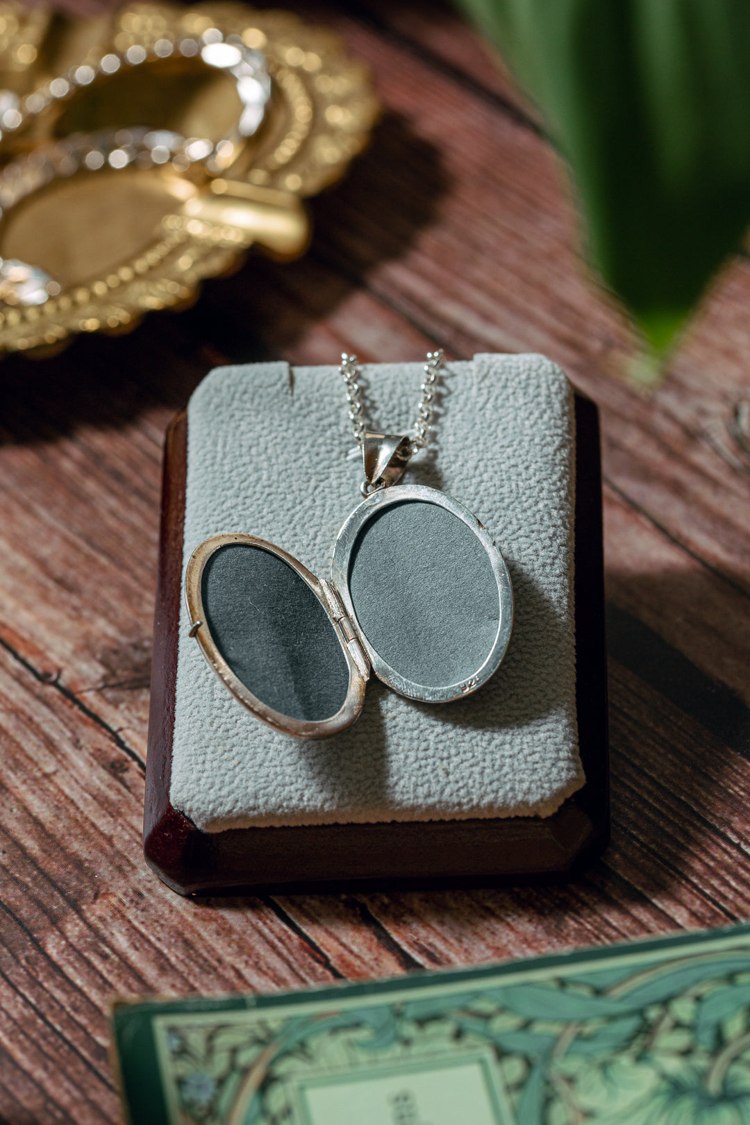 Open locket to reveal the inside